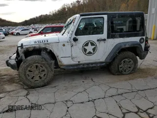 2017 Jeep Wrangler Willys Wheeler with VIN 1C4AJWAG7HL589574, listed as a Copart auction lot 79006504 with 117,075 mi miles and Salvage Title. Bid and sale history available at DreamBid. Image 1.