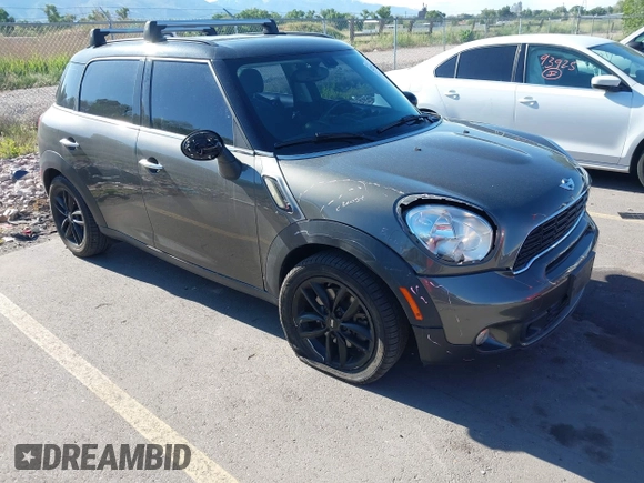2014 MINI Countryman S z VIN WMWZC3C59EWP29686, wystawiony jako IAAI lot #42292047 z przebiegiem 93 139 mil mil oraz . Historia ofert i sprzedaży dostępna na DreamBid. Obrazek 1.
