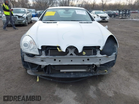 2006 Mercedes-Benz SLK 55 AMG with VIN WDBWK73F66F104476, listed as a IAAI auction lot 41947845 with 87,043 mi miles and . Bid and sale history available at DreamBid. Image 12.