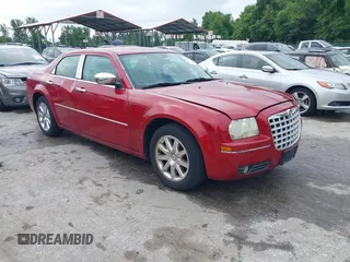 2009 Chrysler 300 Touring with VIN 2C3LA53VX9H565576, listed as a IAAI auction lot 42345532 with 192,610 mi miles and . Bid and sale history available at DreamBid. Image 1.