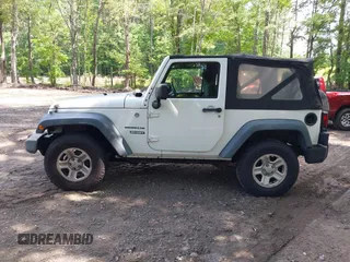 2012 Jeep Wrangler Sport with VIN 1C4AJWAG7CL192200, listed as a IAAI auction lot 42472398 with 198,999 mi miles and . Bid and sale history available at DreamBid. Image 14.