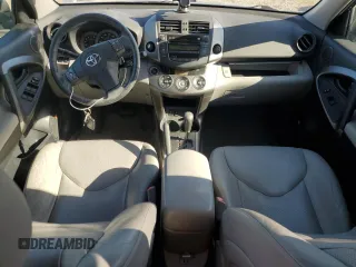 2010 Toyota RAV4 Limited with VIN JTMYK4DV1AD003591, listed as a Copart auction lot 61499555 with 100,940 mi miles and Salvage title. Bid and sale history available at DreamBid. Image 8.