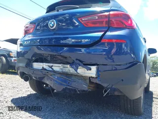 2020 BMW X2 sDrive28i with VIN WBXYH9C05L5P25132, listed as a IAAI auction lot 42269935 with 55,508 mi miles and . Bid and sale history available at DreamBid. Image 6.