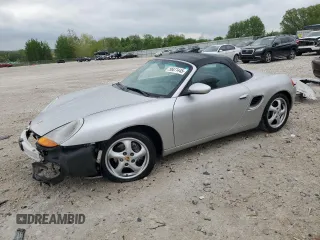 1999 Porsche Boxster z VIN WP0CA2981XU622205, wystawiony jako Copart lot #56871445 z przebiegiem 89 772 mil mil oraz Czysty tytuł • Clean title. Historia ofert i sprzedaży dostępna na DreamBid. Obrazek 1.