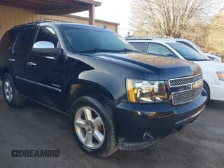 2012 Chevrolet Tahoe LTZ with VIN 1GNSKCE01CR241537, listed as a IAAI auction lot 41620326 with 232,429 mi miles and . Bid and sale history available at DreamBid. Image 1.