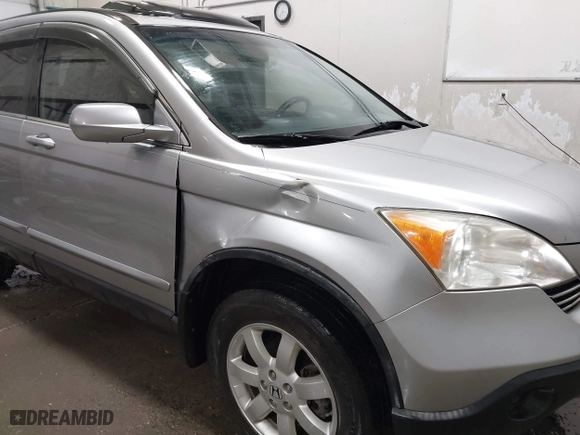 2007 Honda CR-V EX-L with VIN JHLRE38717C066399, listed as a IAAI auction lot 41854827 with 113,281 mi miles. Bid and sale history available at carsss.com. Image 6.