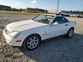 1999 Mercedes-Benz SLK-Class with VIN WDBKK47F9XF101984, listed as a Copart auction lot 74349274 with 66,679 mi miles and Salvage Title. Bid and sale history available at carsss.com. Image 1.