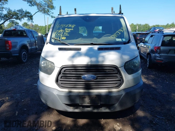 2016 Ford Transit Cargo with VIN 1FTYR1ZM2GKB06257, listed as a IAAI auction lot 42851308 with 239,006 mi miles and . Bid and sale history available at DreamBid. Image 12.