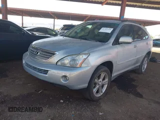 2008 Lexus RX 400h with VIN JTJGW31UX82006093, listed as a IAAI auction lot 41765158 with 191,977 mi miles and . Bid and sale history available at DreamBid. Image 2.