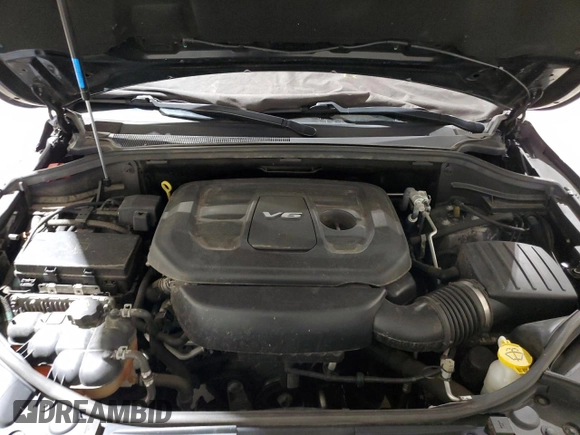 2018 Jeep Grand Cherokee Overland with VIN 1C4RJFCG1JC287784, listed as a Copart auction lot 50391255 with 105,981 mi miles and Salvage title. Bid and sale history available at DreamBid. Image 12.