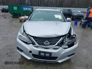 2016 Nissan Altima SV with VIN 1N4AL3AP5GC192300, listed as a IAAI auction lot 41765314 with 162,671 mi miles and . Bid and sale history available at DreamBid. Image 12.