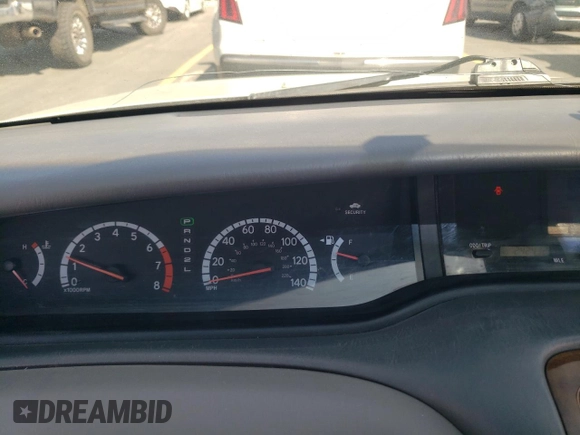 2000 Toyota Avalon XL with VIN 4T1BF28B7YU112576, listed as a Copart auction lot 59726505 with 242,412 mi miles and Salvage title. Bid and sale history available at DreamBid. Image 9.