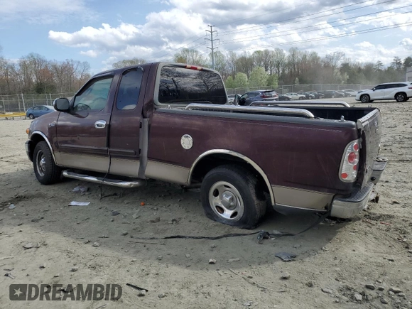 2001 Ford F-150 XL with VIN 1FTZX17211NA94099, listed as a Copart auction lot 50587055 with Not provided miles and Salvage title. Bid and sale history available at DreamBid. Image 2.