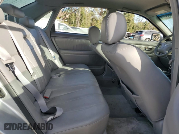 2002 Toyota Avalon XL with VIN 4T1BF28B32U263941, listed as a Copart auction lot 83993504 with 118,438 mi miles and Salvage Title. Bid and sale history available at DreamBid. Image 10.