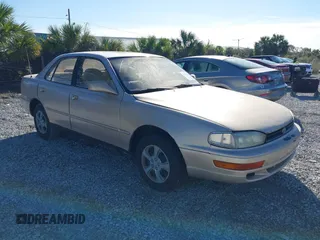 1994 Toyota Camry LE with VIN 4T1SK12E9RU351895, listed as a IAAI auction lot 41239573 with 184,866 mi miles. Bid and sale history available at carsss.com. Image 1.