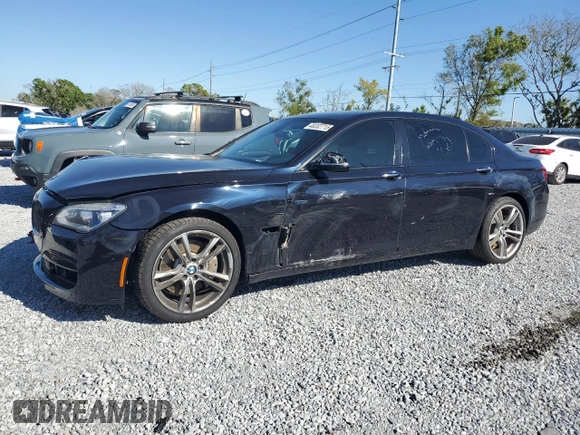 2015 BMW 7 Series 750Li with VIN WBAYE8C51FD781006, listed as a Copart auction lot 48202715 with 50,601 mi miles and Salvage Title. Bid and sale history available at carsss.com. Image 1.