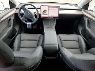 2024 Tesla Model Y z VIN 7SAYGDED4RF054565, wystawiony jako Copart lot #51188065 z przebiegiem 10 540 mil mil oraz Szkoda całkowita • Salvage title. Historia ofert i sprzedaży dostępna na DreamBid. Obrazek 8.