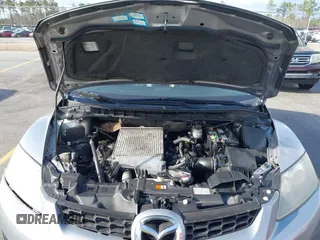 2009 Mazda CX-7 Sport with VIN JM3ER293690218999, listed as a IAAI auction lot 41706965 with 164,806 mi miles. Bid and sale history available at carsss.com. Image 10.
