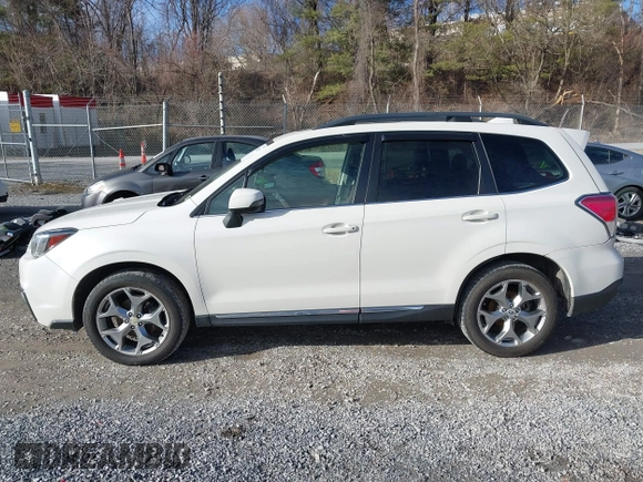 2017 Subaru Forester Touring with VIN JF2SJAWC0HH550052, listed as a IAAI auction lot 41475102 with 115,600 mi miles and . Bid and sale history available at DreamBid. Image 14.