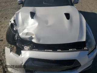 2010 Nissan GT-R Premium z VIN JN1AR5EF4AM231033, wystawiony jako Copart lot #76923304 z przebiegiem 85 706 mil mil oraz Szkoda całkowita • Salvage title. Historia ofert i sprzedaży dostępna na DreamBid. Obrazek 13.