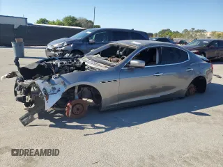 2016 Maserati Ghibli z VIN ZAM57XSA3G1167081, wystawiony jako Copart lot #49139785 z przebiegiem Nie podano mil oraz Tytuł czysty. Historia ofert i sprzedaży dostępna na DreamBid. Obrazek 1.