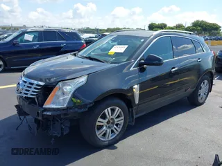 2013 Cadillac SRX Premium Collection with VIN 3GYFNEE34DS535613, listed as a IAAI auction lot 42336365 with 106,426 mi miles and . Bid and sale history available at DreamBid. Image 2.