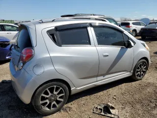 2013 Chevrolet Spark LT with VIN KL8CF6S99DC613354, listed as a Copart auction lot 52751755 with 88,072 mi miles and Salvage Title. Bid and sale history available at DreamBid. Image 3.