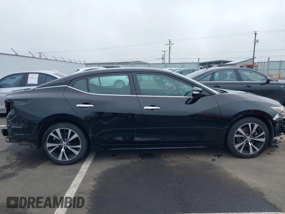 2017 Nissan Maxima SV with VIN 1N4AA6AP8HC444601, listed as a IAAI auction lot 41777190 with 96,488 mi miles and . Bid and sale history available at DreamBid. Image 14.