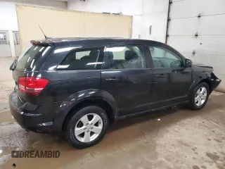 2013 Dodge Journey American Value with VIN 3C4PDCAB9DT505726, listed as a Copart auction lot 87948955 with 113,541 mi miles and Clean Title. Bid and sale history available at DreamBid. Image 3.