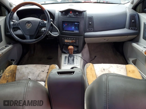 2004 Cadillac CTS with VIN 1G6DM577X40105370, listed as a Copart auction lot 58203715 with 135,391 mi miles and Salvage title. Bid and sale history available at DreamBid. Image 8.