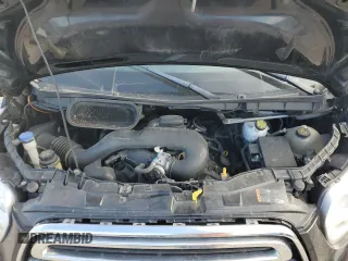 2019 Ford Transit Passenger XL with VIN 1FBZX2ZM5KKA77799, listed as a Copart auction lot 86916184 with 152,833 mi miles and Salvage Title. Bid and sale history available at DreamBid. Image 12.