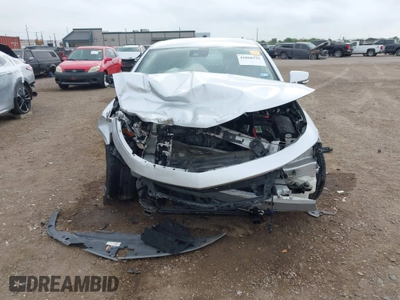 2014 Chevrolet Impala LT with VIN 2G1125S38E9102607, listed as a IAAI auction lot 41860235 with 128,599 mi miles and . Bid and sale history available at DreamBid. Image 13.