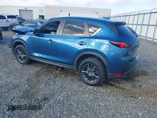 2020 Mazda CX-5 Touring with VIN JM3KFACM0L0775020, listed as a IAAI auction lot 40876970 with 96,424 mi miles. Bid and sale history available at carsss.com. Image 3.