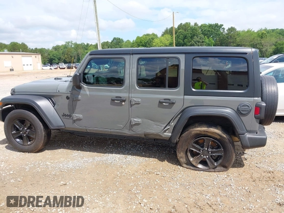 2020 Jeep Wrangler Unlimited Freedom with VIN 1C4HJXDG2LW186027, listed as a IAAI auction lot 42449664 with 87,869 mi miles and . Bid and sale history available at DreamBid. Image 14.