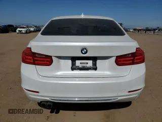 2013 BMW 3 Series 328i xDrive with VIN WBA3B3C51DF532714, listed as a Copart auction lot 57854735 with 140,650 mi miles and Salvage title. Bid and sale history available at DreamBid. Image 6.