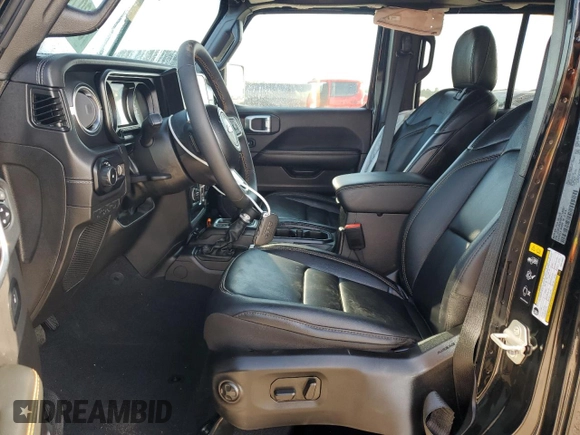 2024 Jeep Wrangler Sahara with VIN 1C4PJXEN1RW118397, listed as a Copart auction lot 56307925 with 7,257 mi miles and Salvage Title. Bid and sale history available at DreamBid. Image 7.