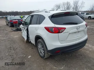 2014 Mazda CX-5 Sport with VIN JM3KE2BE8E0422322, listed as a IAAI auction lot 42009499 with 166,966 mi miles and . Bid and sale history available at carsss.com. Image 3.