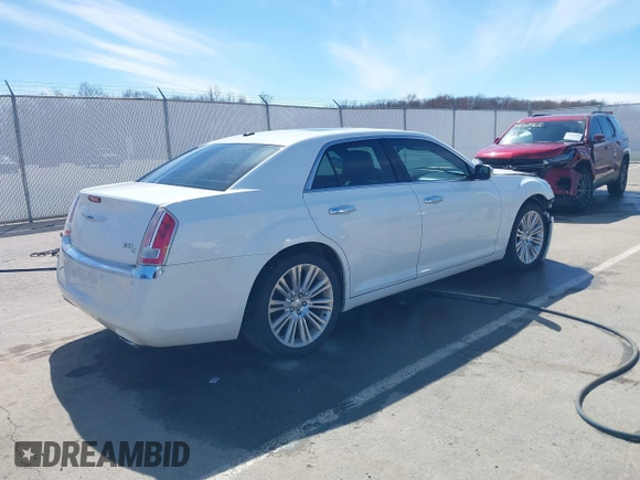 2011 Chrysler 300 with VIN 2C3CA6CTXBH559626, listed as a IAAI auction lot 41876062 with 112,045 mi miles. Bid and sale history available at carsss.com. Image 4.