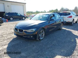2017 BMW 3 Series 330i with VIN WBA8B9C58HK675536, listed as a IAAI auction lot 41665254 with 122,098 mi miles. Bid and sale history available at carsss.com. Image 2.