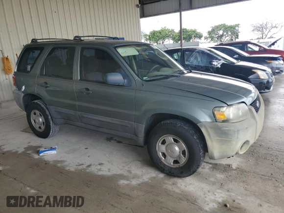 2007 Ford Escape XLS with VIN 1FMYU02Z37KB35521, listed as a Copart auction lot 76533554 with 142,762 mi miles and Salvage Title. Bid and sale history available at carsss.com. Image 4.
