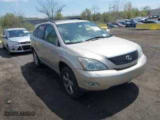 2004 Lexus RX 330 with VIN JTJHA31U340025819, listed as a IAAI auction lot 42038853 with 136,252 mi miles. Bid and sale history available at carsss.com. Image 1.