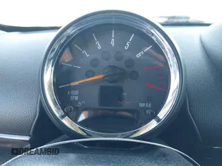 2015 MINI Countryman S z VIN WMWZC5C5XFWP42217, wystawiony jako IAAI lot #41982207 z przebiegiem Nie podano mil oraz . Historia ofert i sprzedaży dostępna na DreamBid. Obrazek 7.