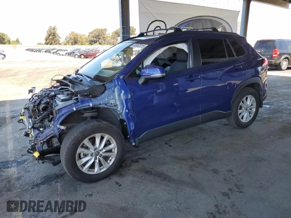 2022 Toyota Corolla Cross LE with VIN 7MUCAAAG6NV021103, listed as a Copart auction lot 56882015 with 21,769 mi miles and Salvage title. Bid and sale history available at DreamBid. Image 1.