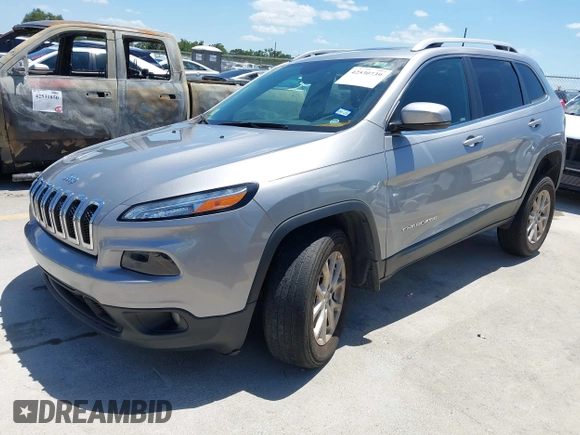 2016 Jeep Cherokee Latitude with VIN 1C4PJMCS1GW300511, listed as a IAAI auction lot 42530739 with 83,097 mi miles and . Bid and sale history available at DreamBid. Image 2.