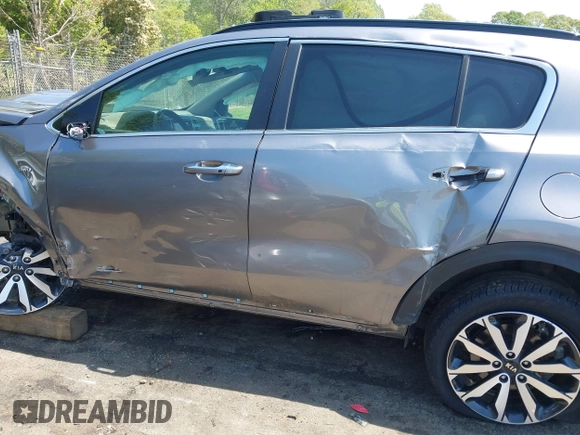 2018 Kia Sportage EX z VIN KNDPNCAC6J7401698, wystawiony jako IAAI lot #42071433 z przebiegiem 88 782 mil mil oraz . Historia ofert i sprzedaży dostępna na DreamBid. Obrazek 13.