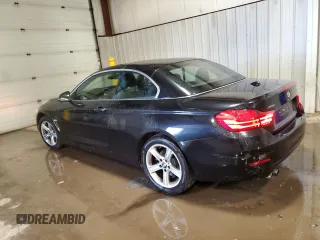 2015 BMW 4 Series 428i xDrive with VIN WBA3T1C52FP821244, listed as a Copart auction lot 42803085 with 71,372 mi miles and Salvage Title. Bid and sale history available at carsss.com. Image 2.