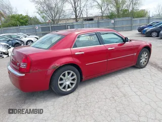 2007 Chrysler 300 C with VIN 2C3KA63H57H684368, listed as a IAAI auction lot 42144972 with 117,478 mi miles. Bid and sale history available at carsss.com. Image 4.