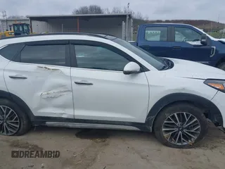 2019 Hyundai Tucson Ultimate with VIN KM8J3CALXKU016834, listed as a IAAI auction lot 40970606 with 104,208 mi miles. Bid and sale history available at carsss.com. Image 13.