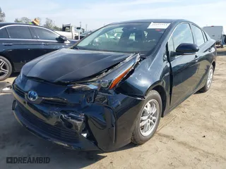 2022 Toyota Prius L Eco with VIN JTDKAMFUXN3163364, listed as a IAAI auction lot 41593914 with 43,948 mi miles. Bid and sale history available at carsss.com. Image 2.