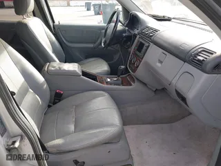 2003 Mercedes-Benz M-Class 3.7L with VIN 4JGAB57EX3A435535, listed as a IAAI auction lot 42099551 with 205,226 mi miles. Bid and sale history available at carsss.com. Image 5.